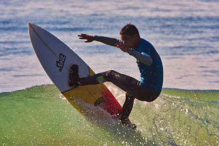 Surfing in the Rincon Classic surfing contest 01-18-2014