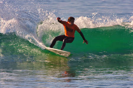 Surfing in the Rincon Classic surfing contest 01-18-2014