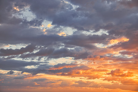 Sky with clouds at sunset. Nature background. Sky with clouds at sunset.