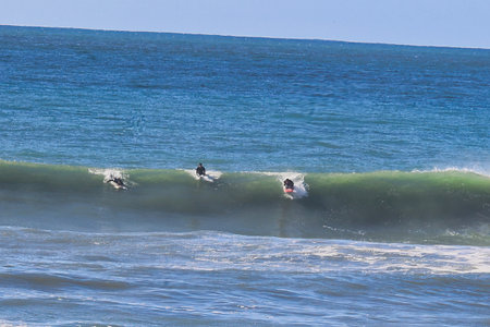 Surfing the waves at Surfers Paradise, Gold Coast, Australia