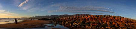 Panoramic view of a rocky beach at sunset, South Australia