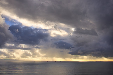 Seascape with dramatic sky and cloud at sunset. Natural background.