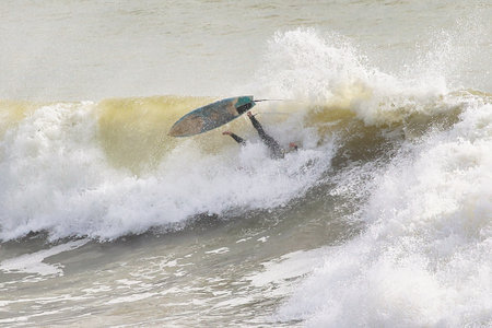Unidentified surfer in action at the 2nd championship of Surf and BodyBoard Impoxibol in Nakhon...