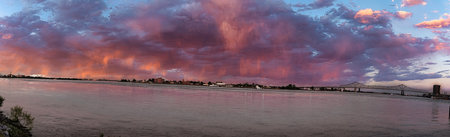 Panorama of sunset over the Tagus river in Lisbon, Portugalの写真素材