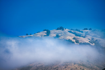 Mountain landscape with clouds and blue sky at Doi Inthanon National Park, Chiang Mai, Thailand