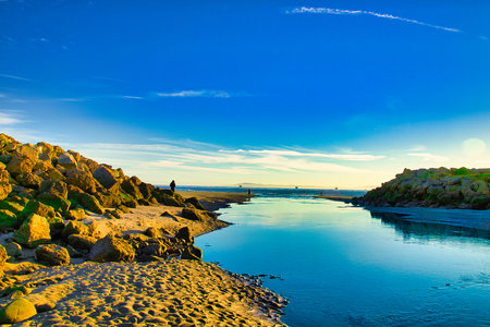 Sunset on the beach of La Concha, Galicia, Spainの写真素材