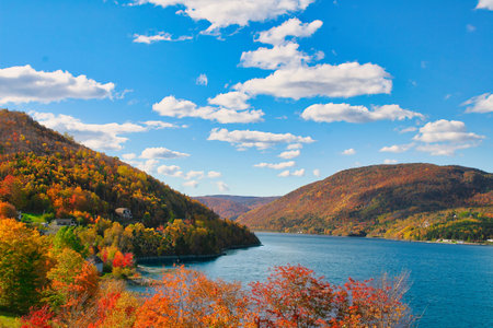 Beautiful autumn landscape with colorful forest on the shore of lake.の写真素材
