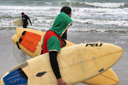 Unidentified surfer gets ready to surf in San Jose, CA, USA.