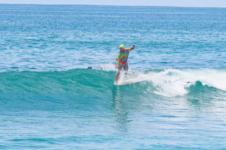 Unidentified Surfer races the Quiksilver & Roxy Pro World Title Event. January 21, 2014, Snapper Rocks, Gold Coast, Australiaの写真素材