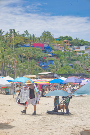 Unidentified people on the beach in Cartagena, Colombiaの写真素材