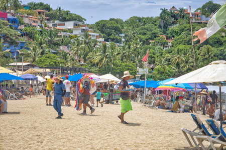 Unidentified people on the beach in Cartagena, Colombiaの写真素材