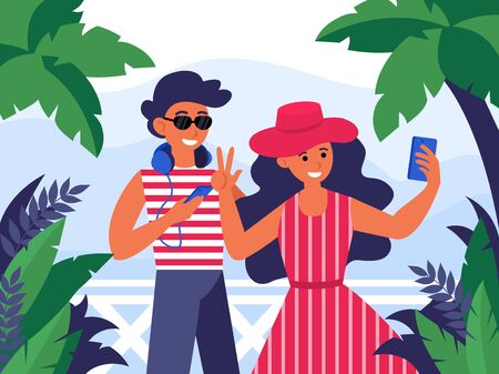 Young man and woman couple posing on mobile camera flat vector illustration. Happy guy in glasses with headphones standing near girl in red dress under palm trees. Holiday and travelling conceptのイラスト素材