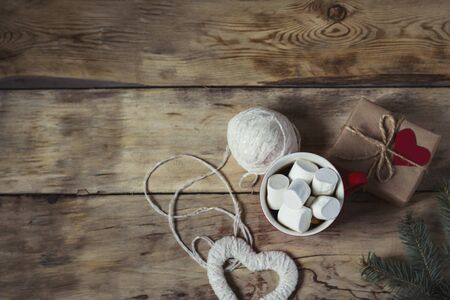 Gift with heart, marshmallow and heart handmade. Valentine's Day concept.の写真素材