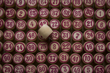 Balls with bingo numbers used to randomly select lucky numbers during a bingo game.