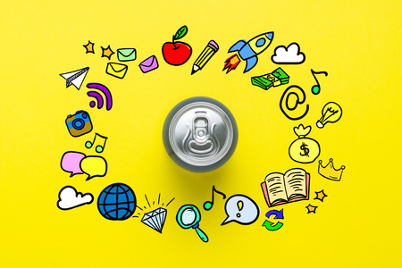 Tin can with a drink on a yellow background with icons. minimalism. The concept of day and night,...