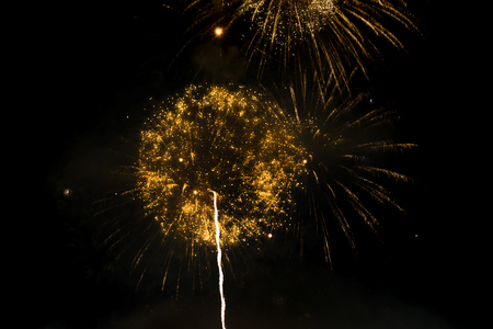 Awesome isolated Festive fireworks on a dark background. Can be used as wallpaper or background.の写真素材