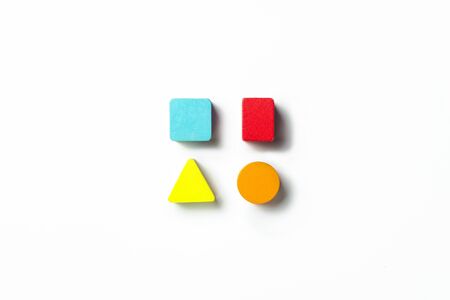 Children's educational toys for logic on a white background. Concept of child development, test. Flat lay, top view.の写真素材