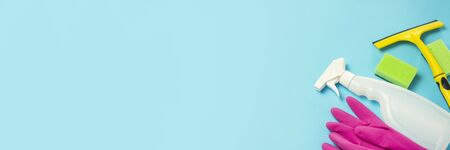 Cleaning and cleaning accessories, Gloves, spray, sponges, scraper for windows on a blue background....