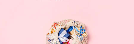 Bag with gifts on a pink background. Gifts concept for family, loved ones, christmas, valentines...