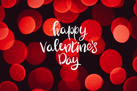 Beautiful yellow and white bokeh on a black background. Can be used as a background or wallpaperの写真素材