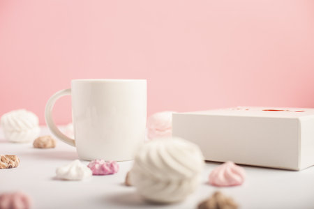 Festive composition for Valentine's Day. Mug and sweets on a pink background. Banner.の写真素材