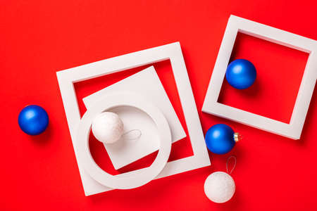 Christmas gifts and toys on a red background. Top view, flat lay.の写真素材