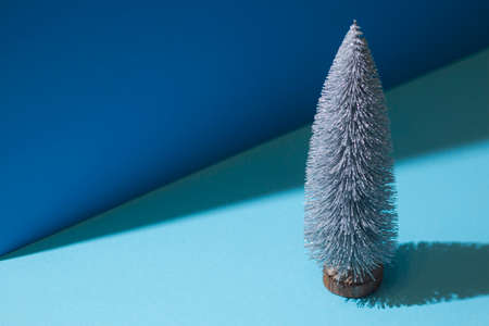 Abstract image of a decorative Christmas tree on a blue backgroundの写真素材