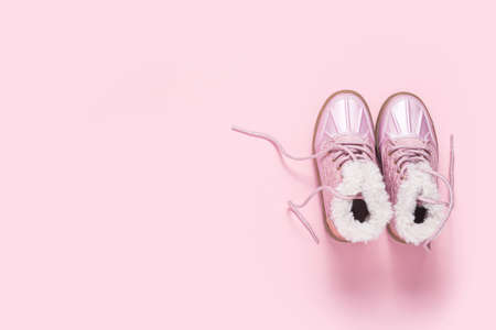 Fashionable shoes for a girl on a pink background. Top view, flat layの写真素材