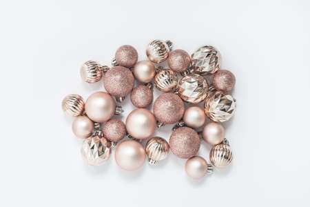 Christmas decorative balls on a white background. Top view, flat lay