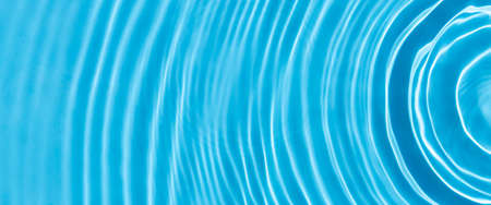 Abstract background of blue water under sunlight. Top view, flat lay.の写真素材