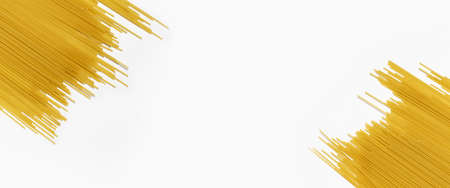 Raw long spaghetti on a white background. Top view, flat lay. Bannerの写真素材