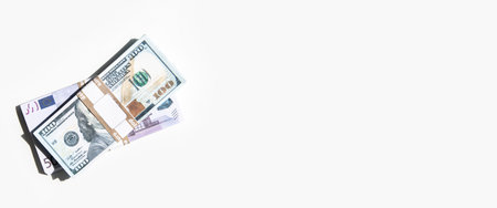 Bundle of money bill dollar on a white background. Top view, flat lay.