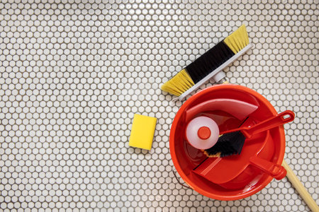 Cleaning products on a tiled surface. Top view, flat lay.の写真素材