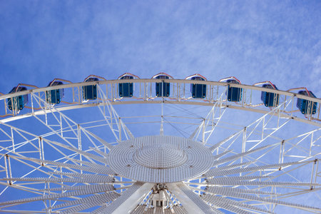Ferris wheel on the background of the sky view from below.の写真素材
