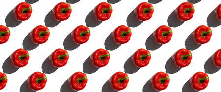 Red fresh paprika pepper on a white background. Top view, flat lay. Banner.