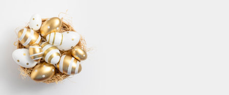 Bowl with Easter eggs on a white background.の写真素材