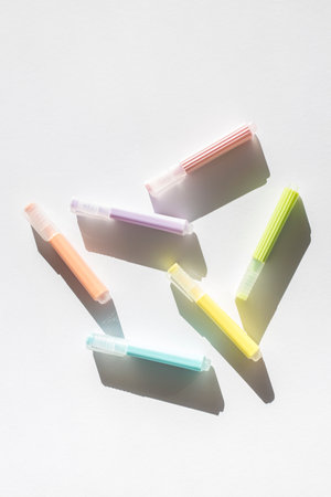 Colored markers pens on a white background. Top view, flat lay.の写真素材