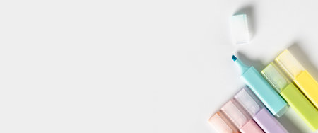 Colored markers felt-tip pens on a white background. Top view, flat lay. Banner.の写真素材