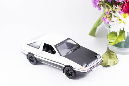 White toy car on a white background.の写真素材