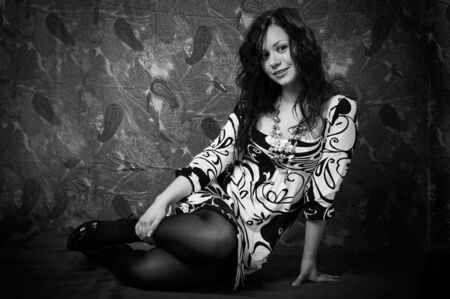 portrait of a young dark-haired girl. black and white photo.の写真素材