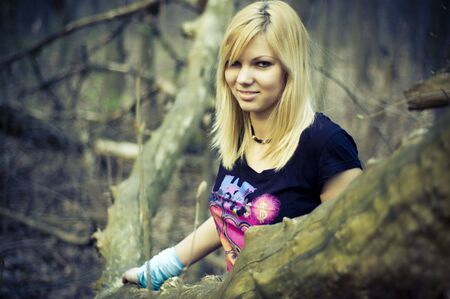  close-up photo of beautiful young girl in the woodsの写真素材