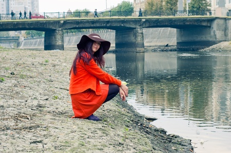 girl on the riverbankの写真素材