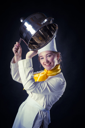 Photo of a cook drumming with pan and ladle.の写真素材