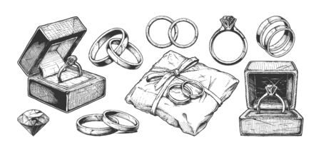 Vector hand drawn illustration of different wedding jewelry rings in vintage engraved style. isolated on white background.のイラスト素材