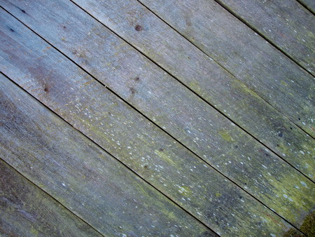 An old wooden wall made of pineの写真素材