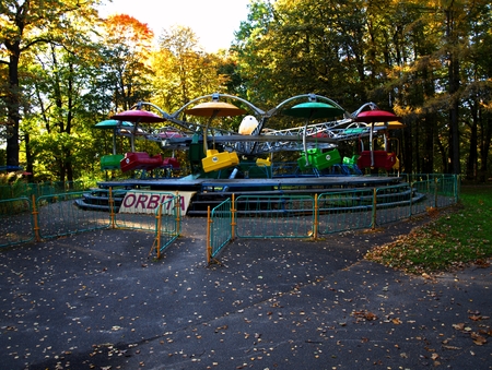 carousel in an oak park in autumnの写真素材