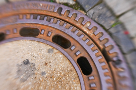 Abstract background with part of manholeの写真素材