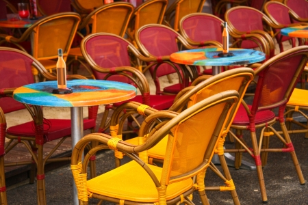 Bright chairs outside of restaurantの写真素材