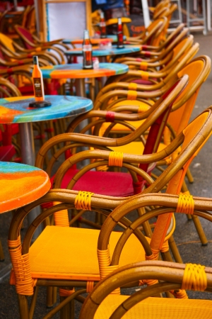Bright chairs outside of restaurantの写真素材