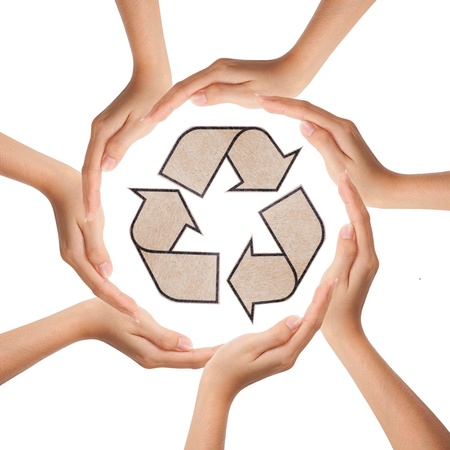 Multiracial human hands making a circle with recycle signの写真素材